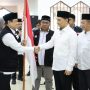 Sekretaris PPIH Embarkasi Pondok Gede Jakarta, H. Ahmad Bahir menerima jemaah haji kloter 57 JKG